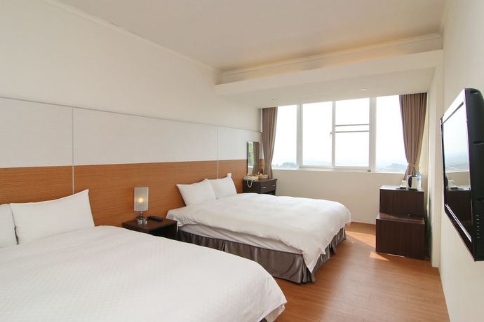 Imagen de la habitación del Hotel Wusanto Huching Resort. Foto 12