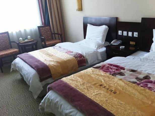 Imagen de la habitación del Hotel Wutaishan Jingyuan Hotel. Foto 12