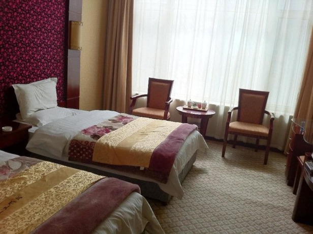 Imagen de la habitación del Hotel Wutaishan Jingyuan Hotel. Foto 14