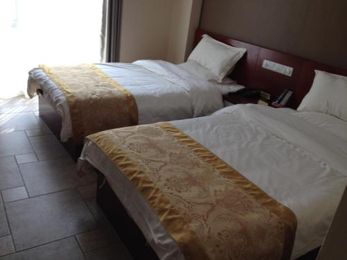 Imagen de la habitación del Hotel Wutaishan Lingfeng Shanzhuang Wuye Temple. Foto 6