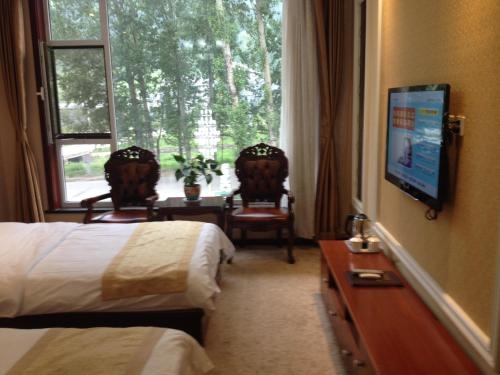 Imagen general del Hotel Wutaishan Lingfeng Shanzhuang Wuye Temple. Foto 2