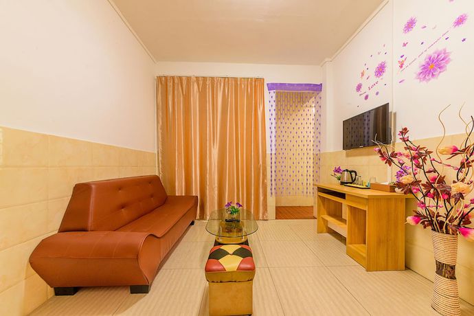 Imagen de la habitación del Hotel Wutongyu Apartment. Foto 2