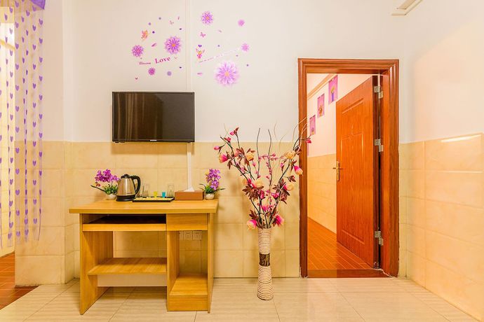 Imagen de la habitación del Hotel Wutongyu Apartment. Foto 3