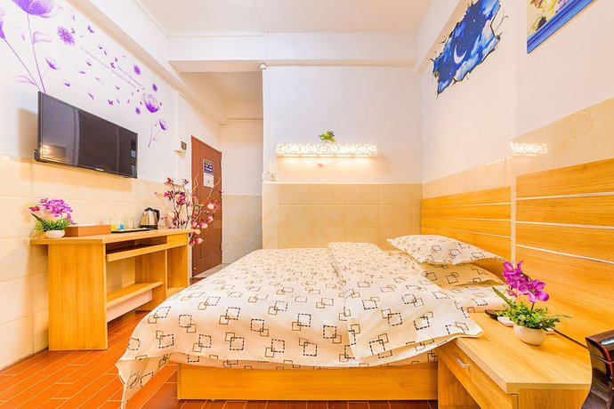 Imagen de la habitación del Hotel Wutongyu Apartment. Foto 4