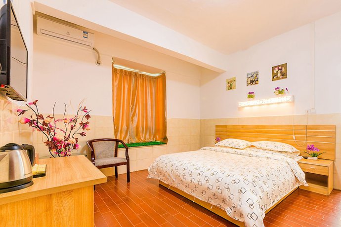 Imagen de la habitación del Hotel Wutongyu Apartment. Foto 6