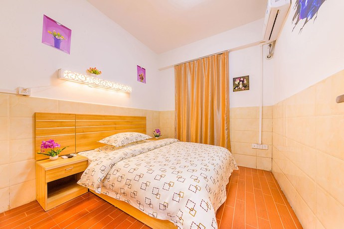 Imagen de la habitación del Hotel Wutongyu Apartment. Foto 7