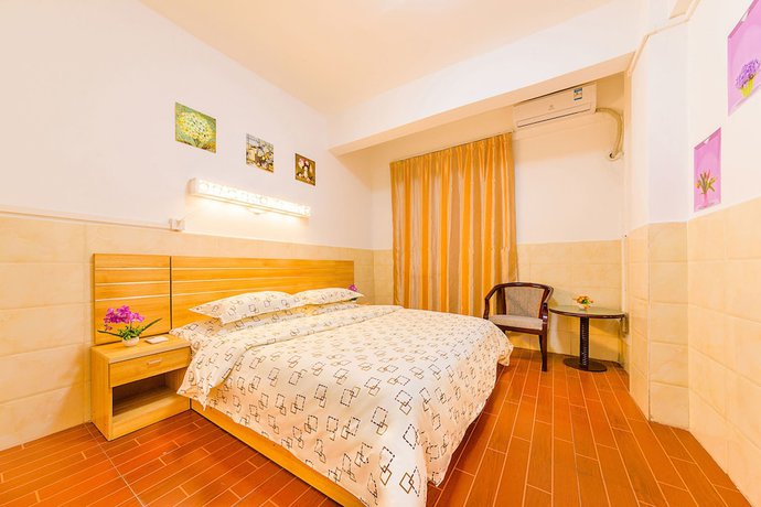 Imagen de la habitación del Hotel Wutongyu Apartment. Foto 9
