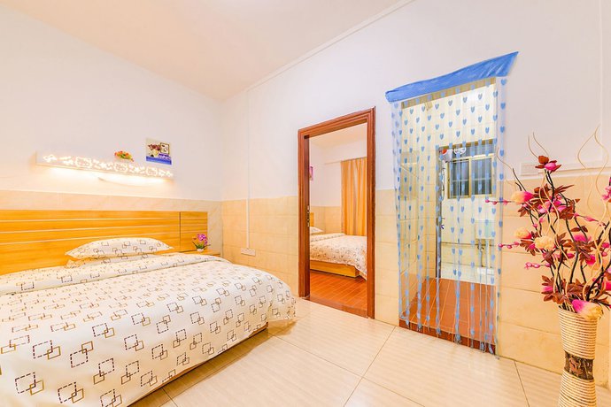 Imagen de la habitación del Hotel Wutongyu Apartment. Foto 10