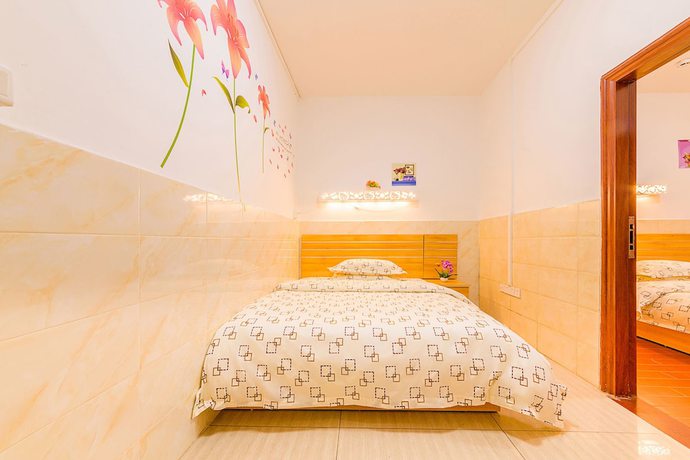 Imagen de la habitación del Hotel Wutongyu Apartment. Foto 12