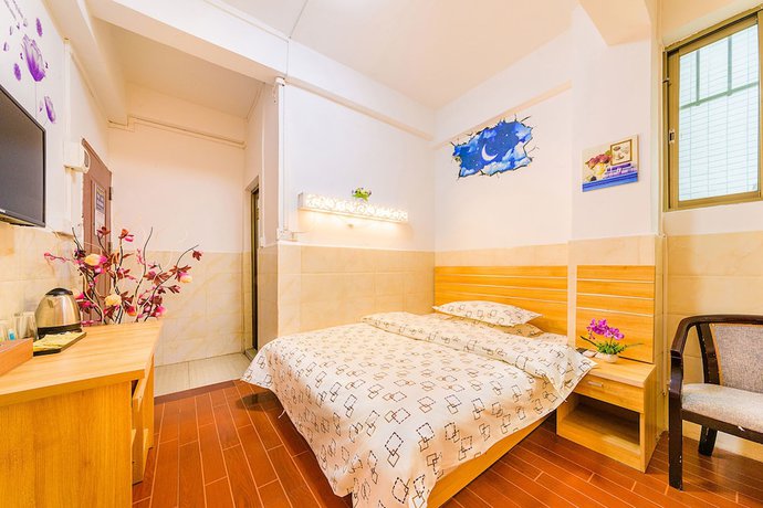Imagen de la habitación del Hotel Wutongyu Apartment. Foto 13