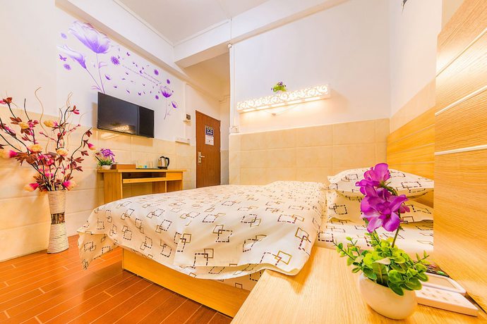 Imagen de la habitación del Hotel Wutongyu Apartment. Foto 16