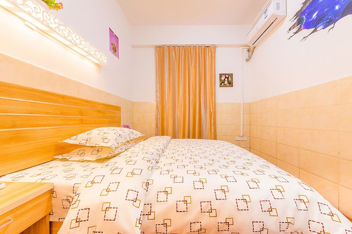 Imagen de la habitación del Hotel Wutongyu Apartment. Foto 17