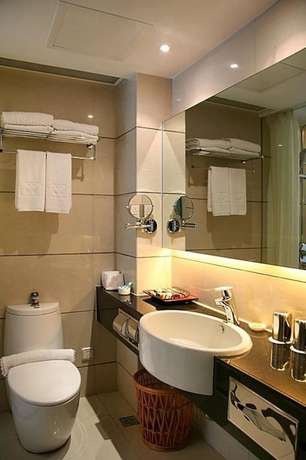 Imagen de la habitación del Hotel Wuxi 1881 Peninsula Hotel. Foto 4