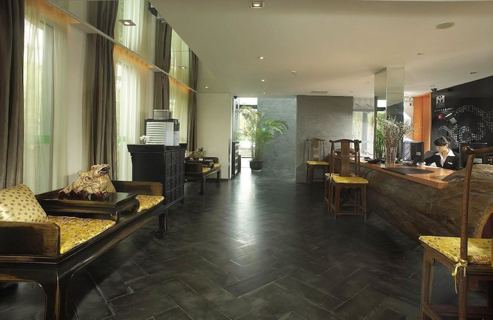 Imagen de la habitación del Hotel Wuxi 1881 Peninsula Hotel. Foto 9