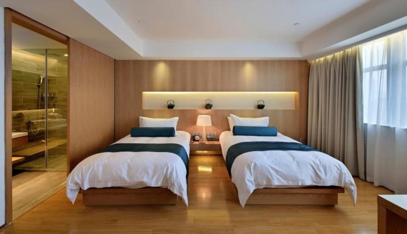 Imagen de la habitación del Hotel Wuxi Shuyu. Foto 2