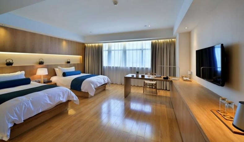 Imagen de la habitación del Hotel Wuxi Shuyu. Foto 3