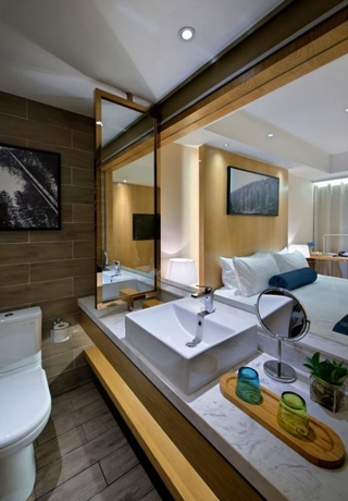 Imagen de la habitación del Hotel Wuxi Shuyu. Foto 6