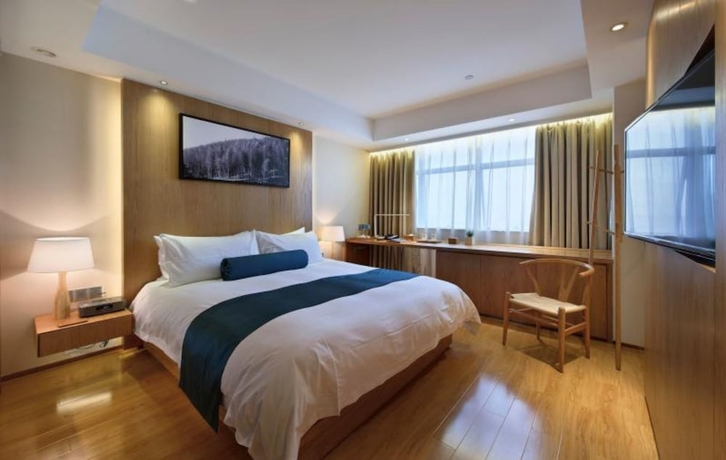 Imagen de la habitación del Hotel Wuxi Shuyu. Foto 7