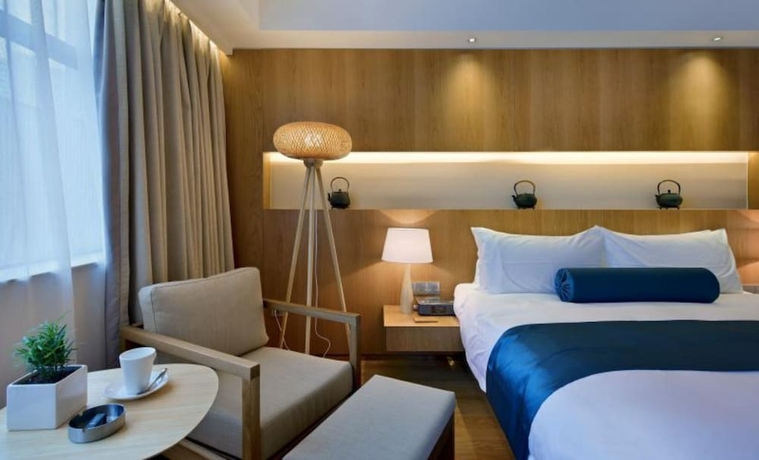 Imagen de la habitación del Hotel Wuxi Shuyu. Foto 9