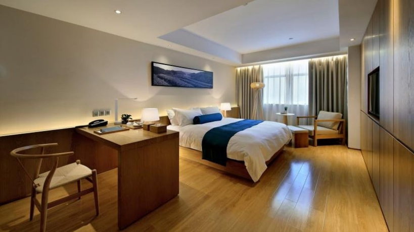 Imagen de la habitación del Hotel Wuxi Shuyu. Foto 10