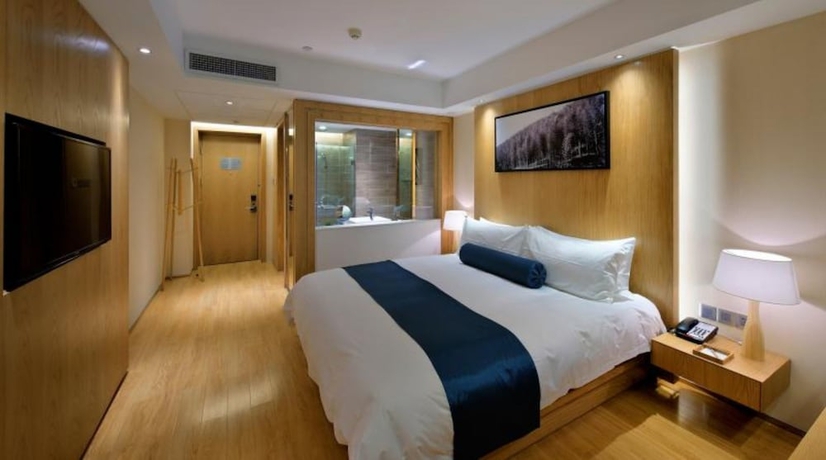 Imagen de la habitación del Hotel Wuxi Shuyu. Foto 13