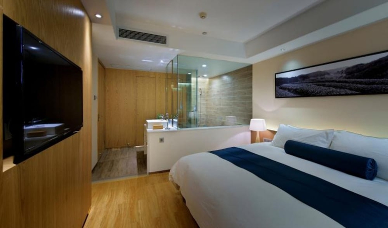 Imagen de la habitación del Hotel Wuxi Shuyu. Foto 15