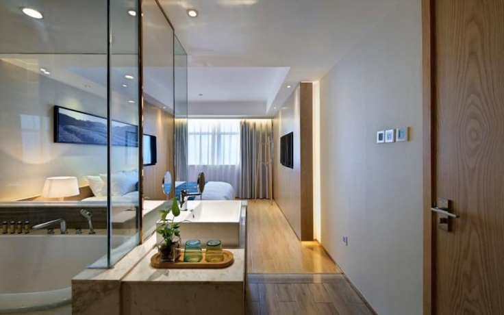 Imagen de la habitación del Hotel Wuxi Shuyu. Foto 16