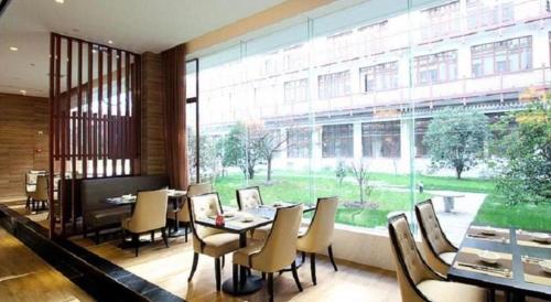 Imagen general del Hotel Wuxi Zenmore. Foto 4
