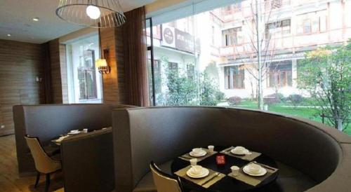 Imagen general del Hotel Wuxi Zenmore. Foto 7