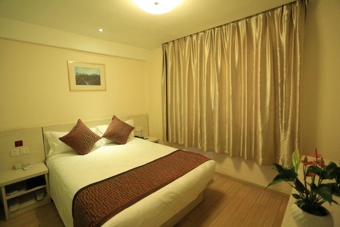 Imagen de la habitación del Hotel Wuyang Inn Hangzhou. Foto 2