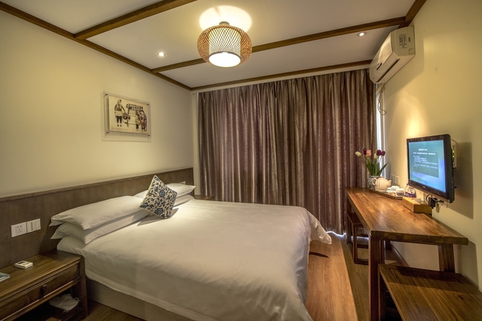 Imagen de la habitación del Hotel Wuyang Inn Hangzhou. Foto 6