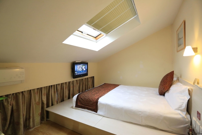 Imagen de la habitación del Hotel Wuyang Inn Hangzhou. Foto 9
