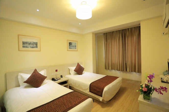 Imagen de la habitación del Hotel Wuyang Inn Hangzhou. Foto 10