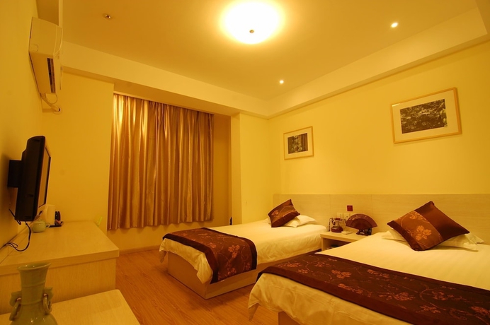 Imagen de la habitación del Hotel Wuyang Inn Hangzhou. Foto 11