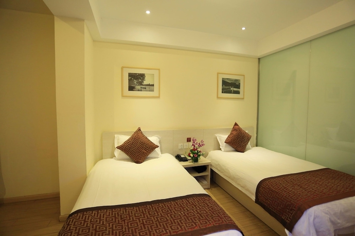 Imagen de la habitación del Hotel Wuyang Inn Hangzhou. Foto 13