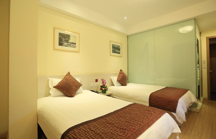 Imagen de la habitación del Hotel Wuyang Inn Hangzhou. Foto 14