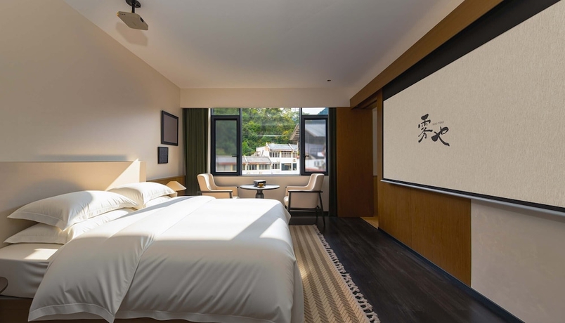 Imagen de la habitación del Hotel Wuye WOO YEAH Tangchi. Foto 4