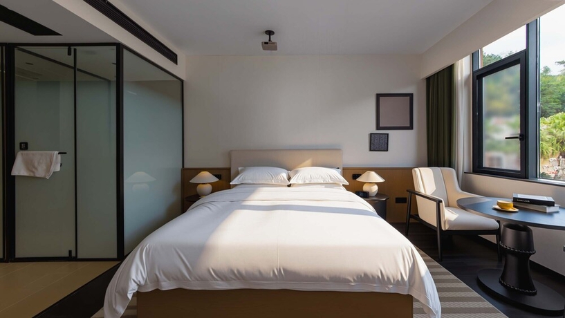 Imagen de la habitación del Hotel Wuye WOO YEAH Tangchi. Foto 5