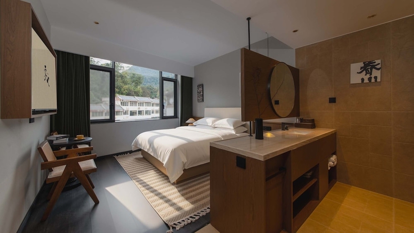 Imagen de la habitación del Hotel Wuye WOO YEAH Tangchi. Foto 6