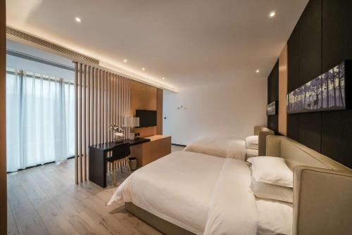 Imagen de la habitación del Hotel Wuyi Mount Happiness Zhihui. Foto 8