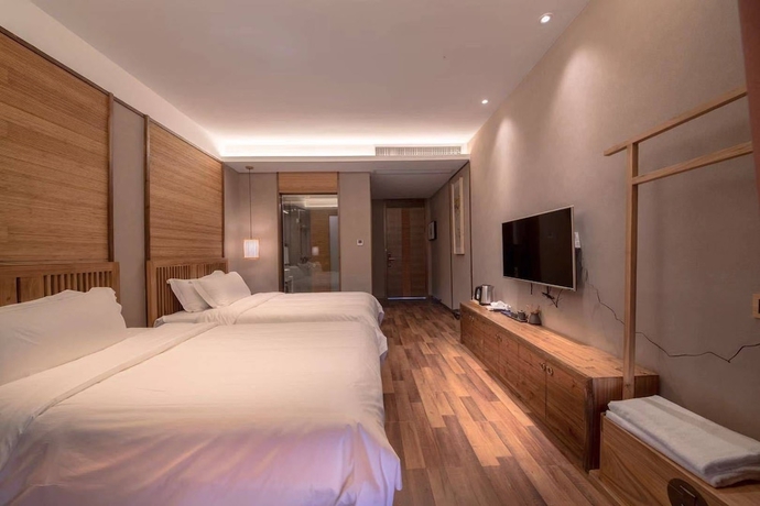 Imagen de la habitación del Hotel Wuyi Mountain Jiuquyuan Tea Garden. Foto 4