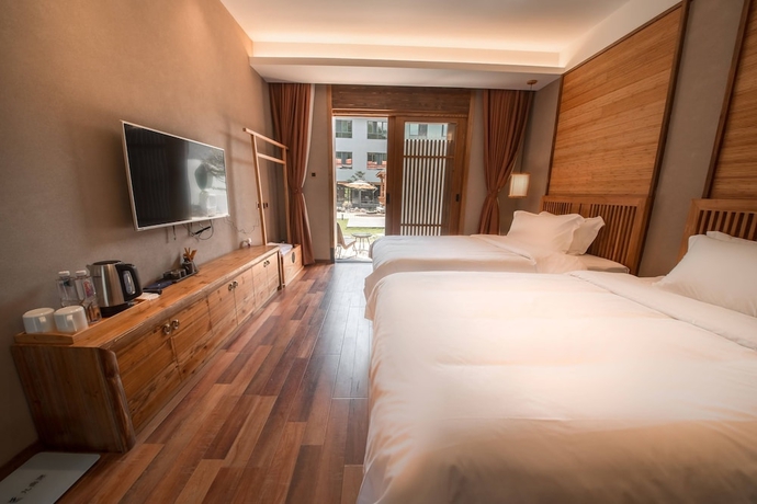 Imagen de la habitación del Hotel Wuyi Mountain Jiuquyuan Tea Garden. Foto 5