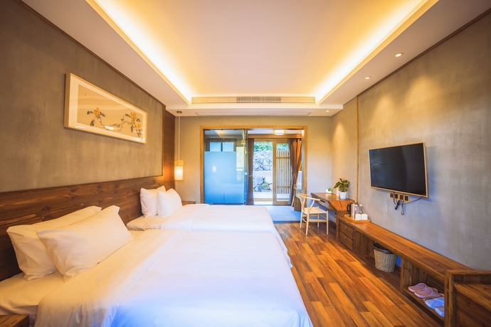 Imagen de la habitación del Hotel Wuyi Mountain Jiuquyuan Tea Garden. Foto 6