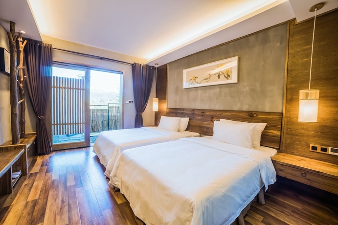 Imagen de la habitación del Hotel Wuyi Mountain Jiuquyuan Tea Garden. Foto 7