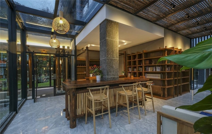 Imagen de los interiores del Hotel Wuyi Mountain Jiuquyuan Tea Garden. Foto 19