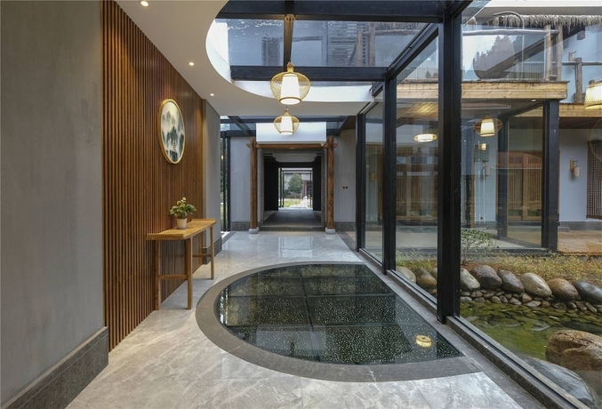 Imagen de los exteriores del Hotel Wuyi Mountain Jiuquyuan Tea Garden. Foto 15