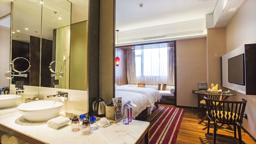 Imagen de la habitación del Hotel Wuyi Mountain Resort. Foto 7