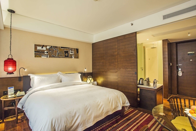 Imagen de la habitación del Hotel Wuyi Mountain Resort. Foto 8