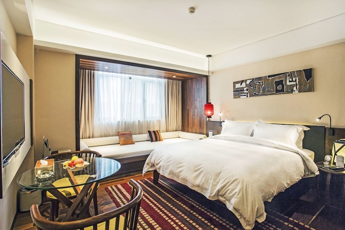 Imagen de la habitación del Hotel Wuyi Mountain Resort. Foto 13