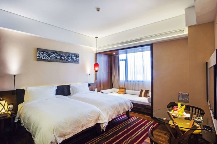 Imagen de la habitación del Hotel Wuyi Mountain Resort. Foto 14